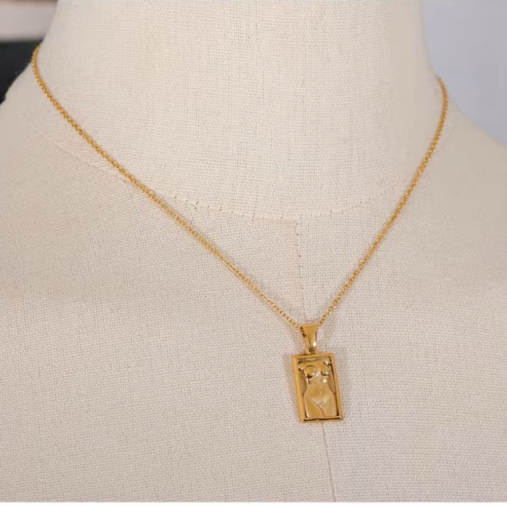Silhouette of Gold Pendant Necklace